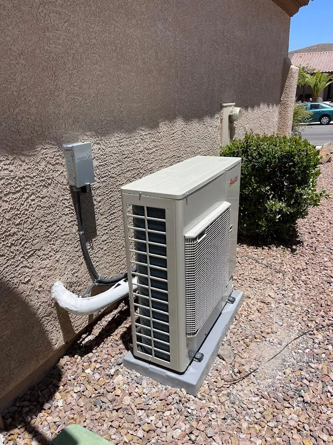 Residential air conditioning condenser unit in Caldwell